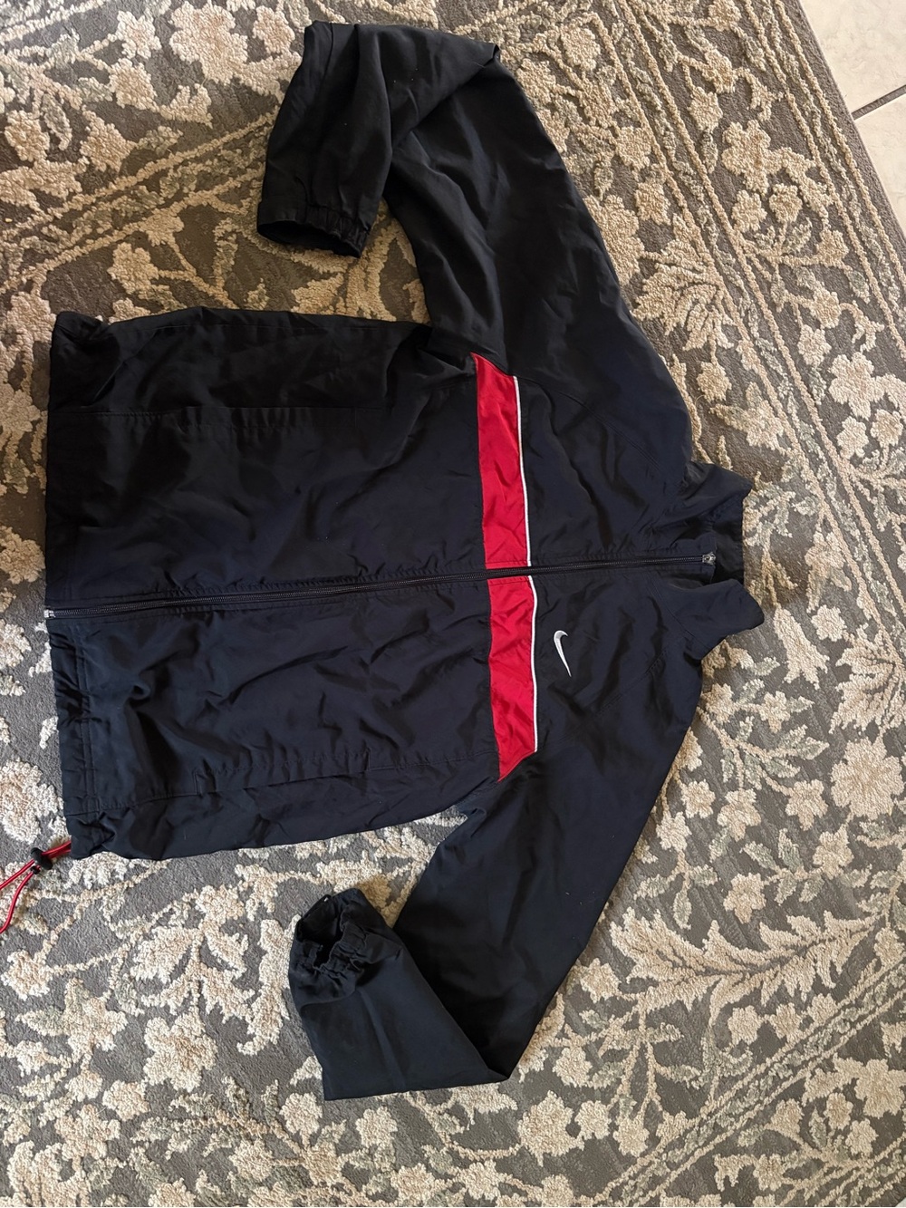 Nike Men’s Black Windbreaker with Red Chest Stripe